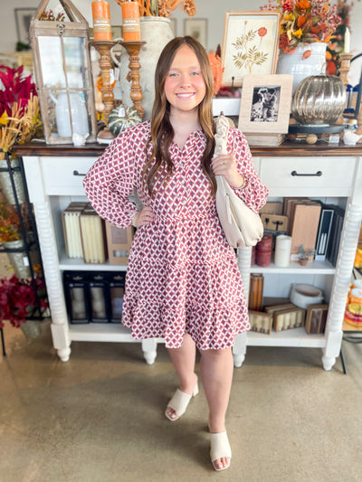 long sleeve red, blue, and white pattern dress with collar and elastic sleeves