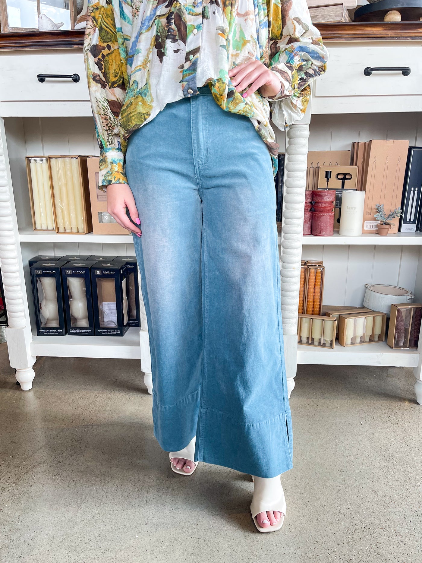 blue corduroy wide leg pants with belt loops and button closure 
