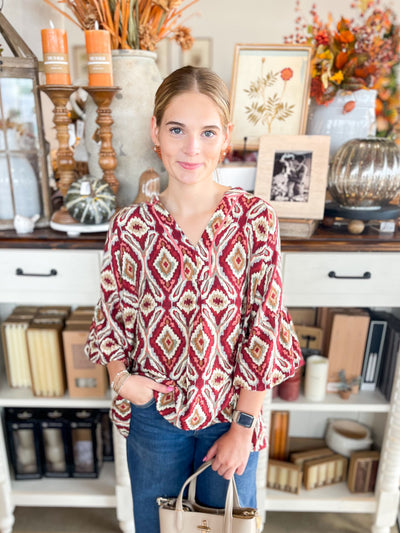 trendy wine color  tribal print top with v-neck and puff sleeves
