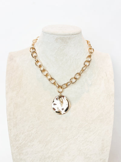 gold chain link necklace with hammered circle pendant 