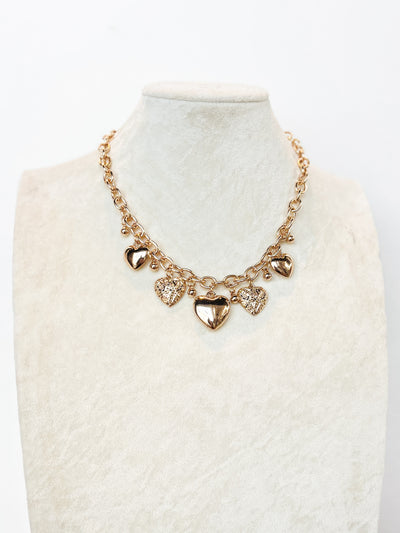 gold chain link heart charm necklace with matching earrings 
