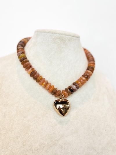 natural color beaded necklace with chunky heart charm