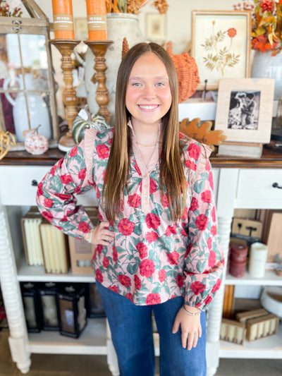 stunning long sleeve red and green floral top with ruffles and button details 