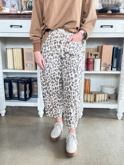 slightly cropped leopard print pants with pockets and tie waist 