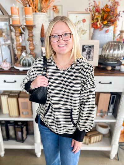 black and white striped casual hoodie with front pocket and oversized fit 